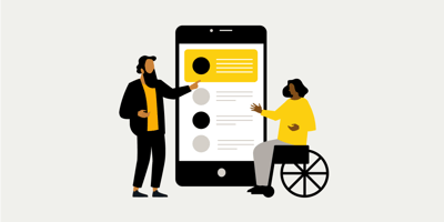 a woman in a wheelchair and a man interacting on a smartphone