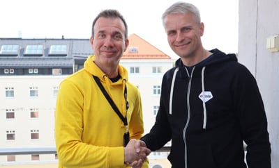 Ilari Nurmi and Patrick Sallner shaking hands